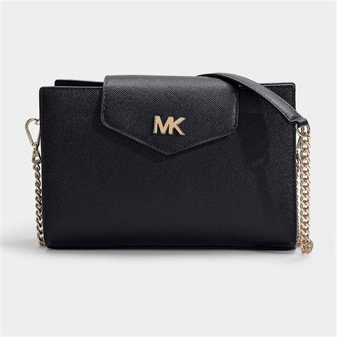 michael michael kors crossbody clutch|Michael Kors women's black clutch.